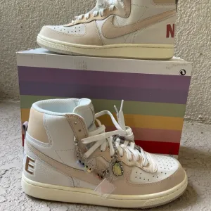Nike White and Cream High-Top Sneakers