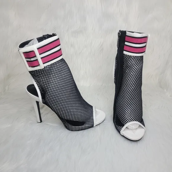 Open toe black mesh stiletto heeled ankle boots.