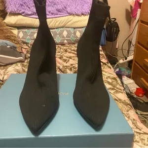 Pashion Footwear convertible heels the bootiein black with four inch block