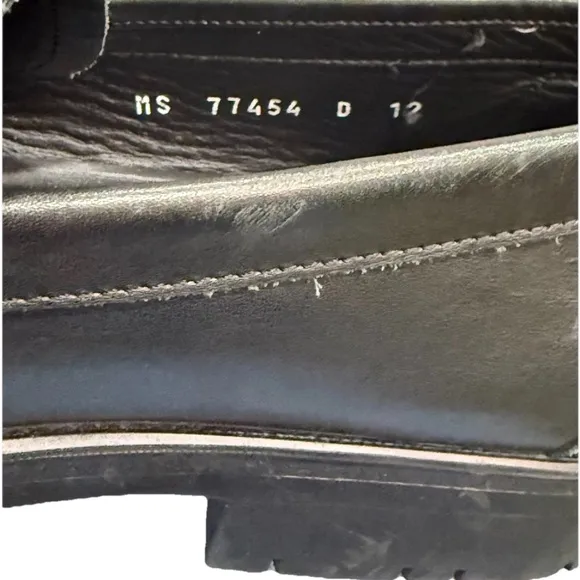 Salvatore Ferragamo Black Slip-On Loafers with Silver Hardware