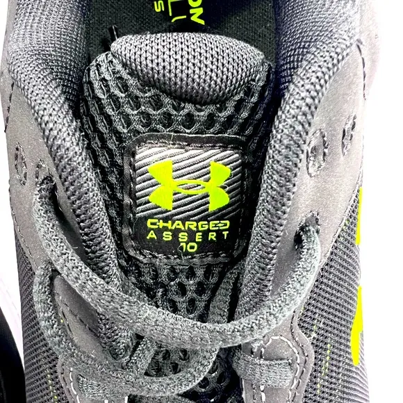 UNDER ARMOR MEN’S 10.5 UA CHARGED ASSERT 10, BLACK COLOR WITH LIME GREEN LOGO