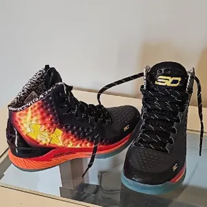 Under Armour Black and Red High-Top Sneakers
