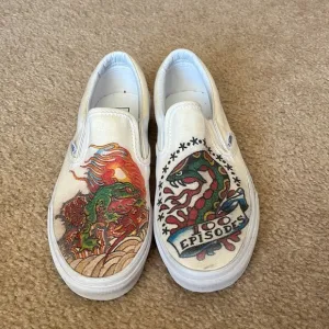 Vans hand painted snake and frog slip on shoes.