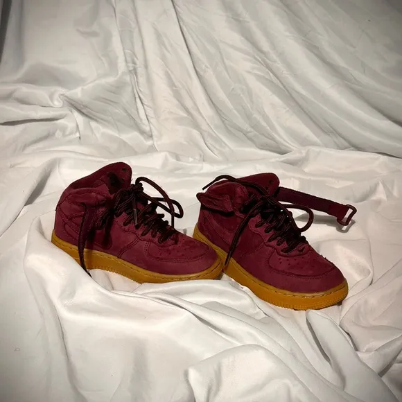 Vibrant Burgundy High-Top Sneakers with Gold Soles