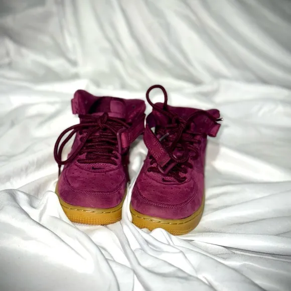 Vibrant Burgundy High-Top Sneakers with Gold Soles
