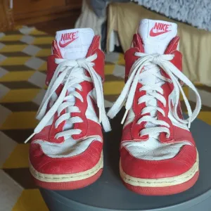 Vintage 1990's Nike  Red and White University High-Top Sneakers. Mens Size 9.
