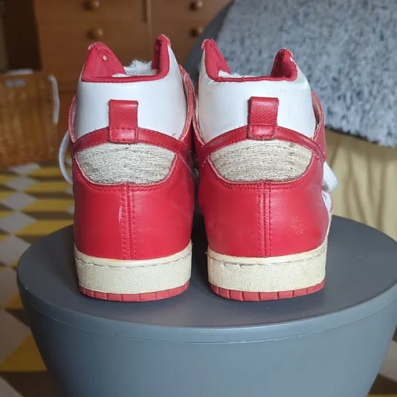Vintage 1990's Nike  Red and White University High-Top Sneakers. Mens Size 9.