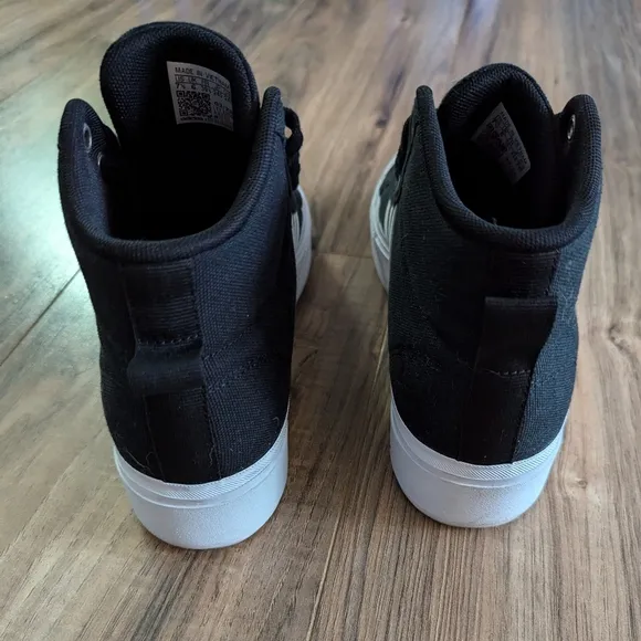Women's high top Adidas Black and white sneakers size 7.5. Classic Adidas