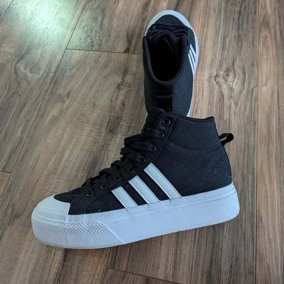 Women's high top Adidas Black and white sneakers size 7.5. Classic Adidas
