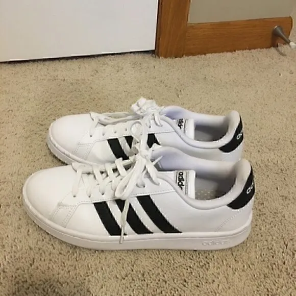 Women’s size 8.5 Adidas black and white shoes