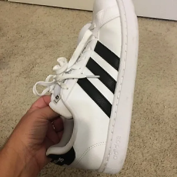 Women’s size 8.5 Adidas black and white shoes