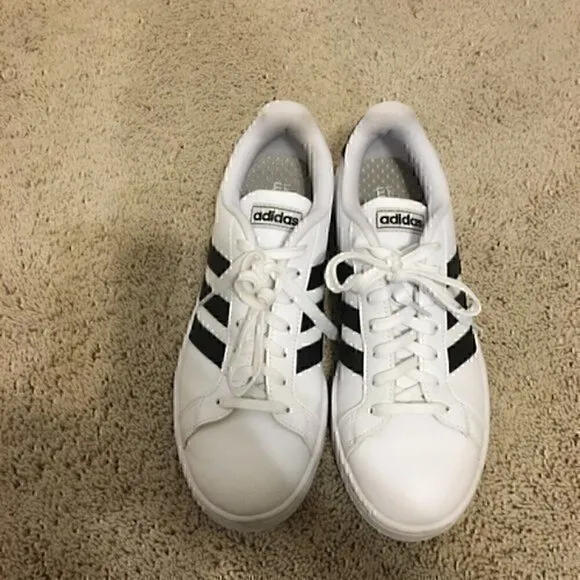 Women’s size 8.5 Adidas black and white shoes