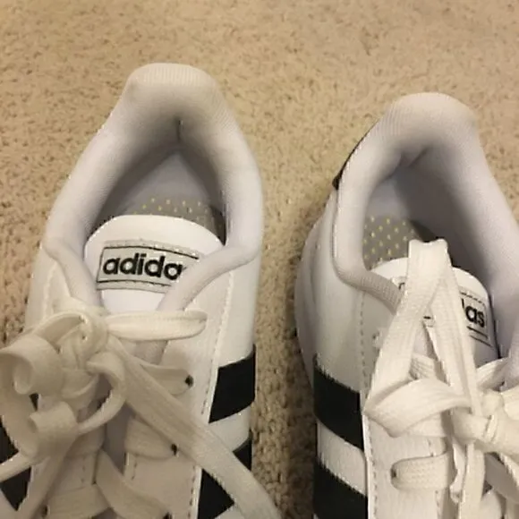 Women’s size 8.5 Adidas black and white shoes